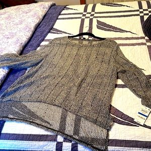 Net mesh top, with subtle sparkle great for New Year’s or any party